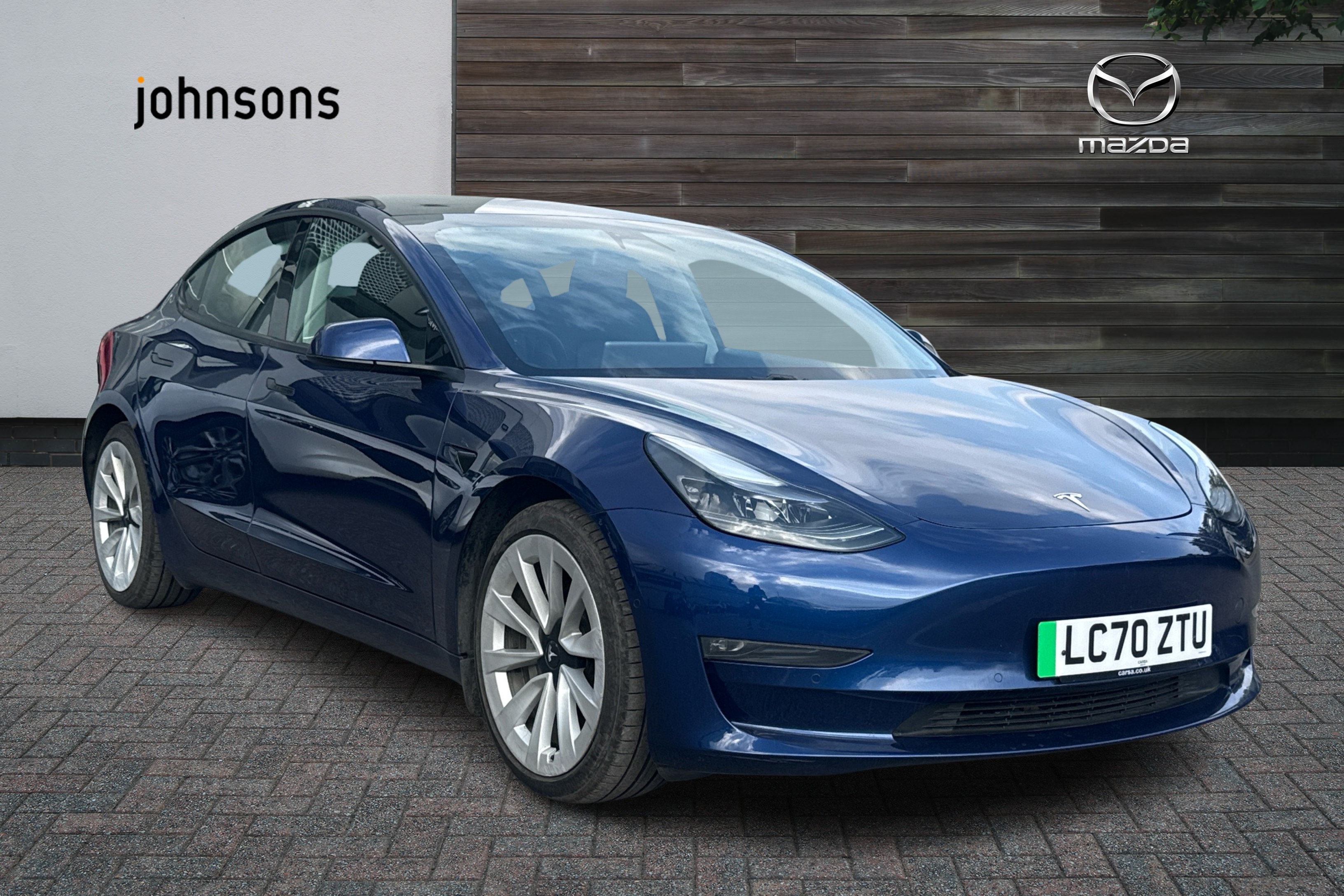 Tesla Model 3 listing photo